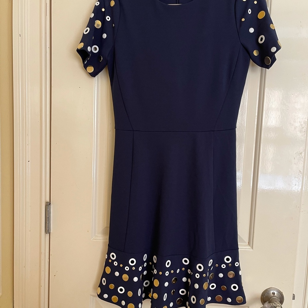 This is a navy blue dress by MK size small in excellent condition